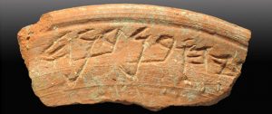 A ceramic bowl shard with a 2,700-year-old inscription. City of David